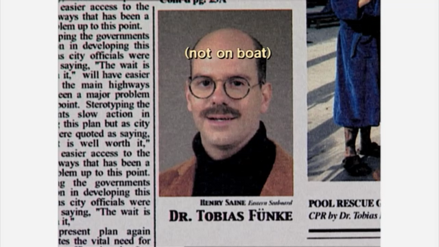 File:1x01 Tobias newspaper closeup.png