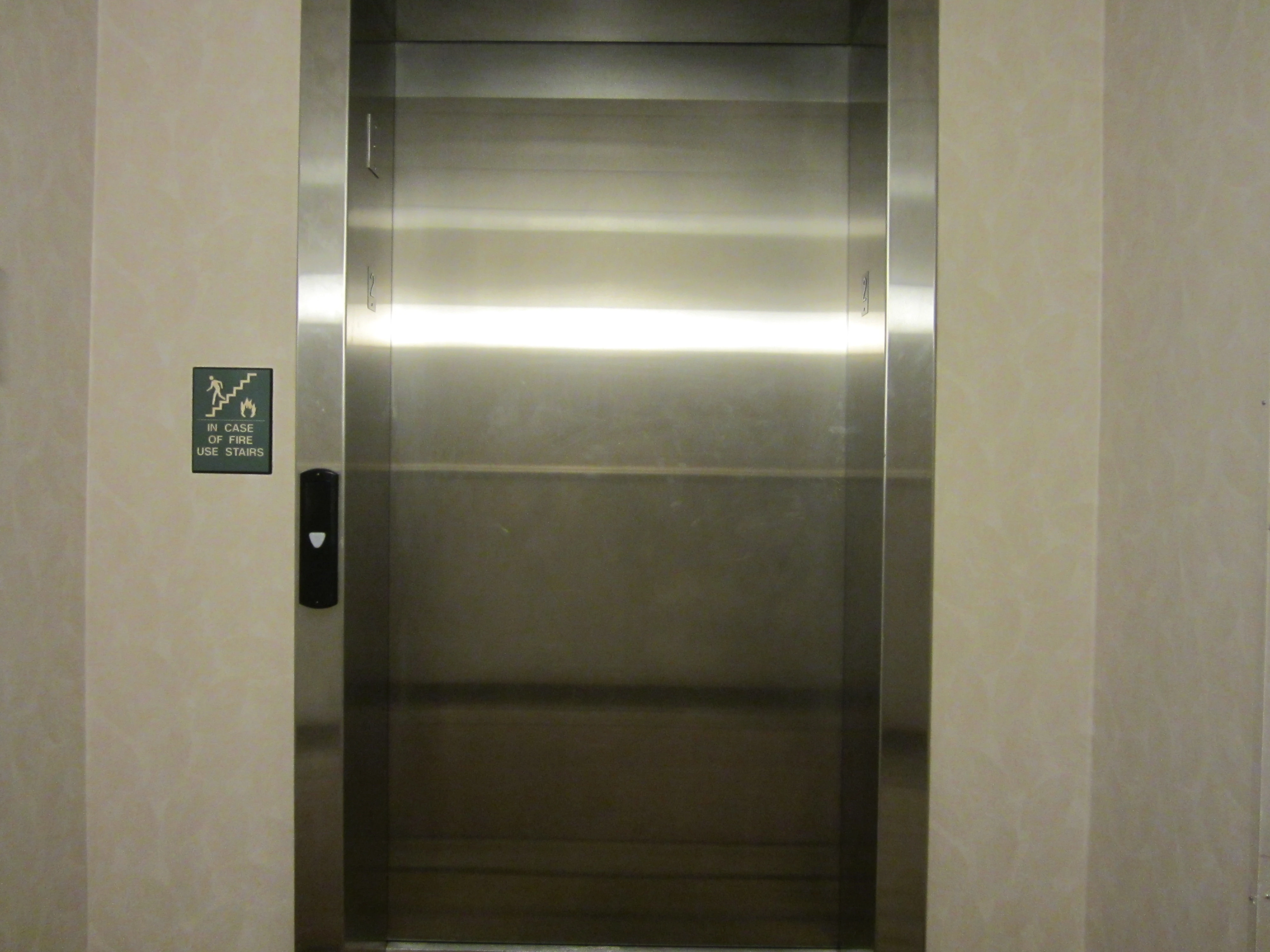 how to open elevator door