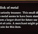 Small disk of metal