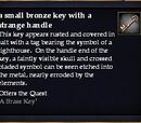 A small bronze key with a strange handle