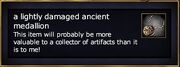 A lightly damaged ancient medallion