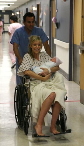 File:Dee with baby.jpg