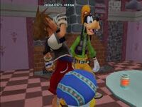 Sora tomando la pocion para hacerse pequeño.jpg