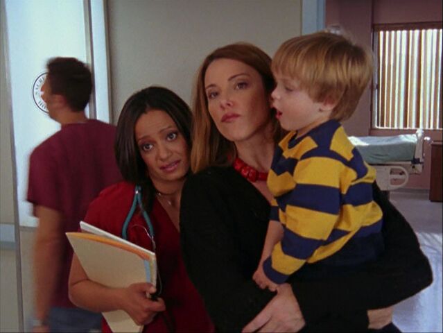 File:5x9-Carla and Jordan boss Cox around.jpg
