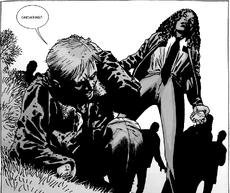 Michonne deteniendo a Rick