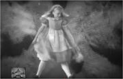 Alice floating down