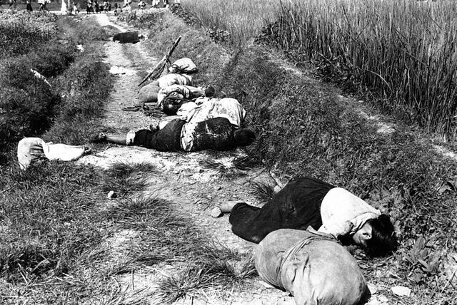 File:Korean civilians fleeing from the North Korean forces, killed when caught in the line of fire during night attack by guerrilla forces near Yongsan HD-SN-99-03166.jpg
