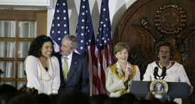 President George W Bush congratulates singer Jordin Sparks