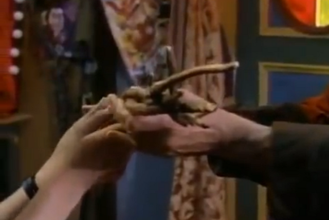 File:2magicianbeinghandedthewand.png