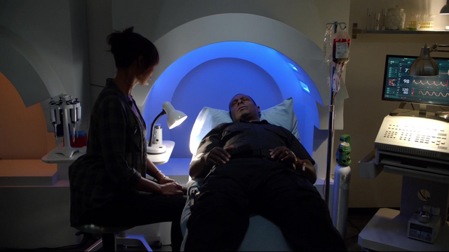 File:M'gann at J'onn's bedside.png