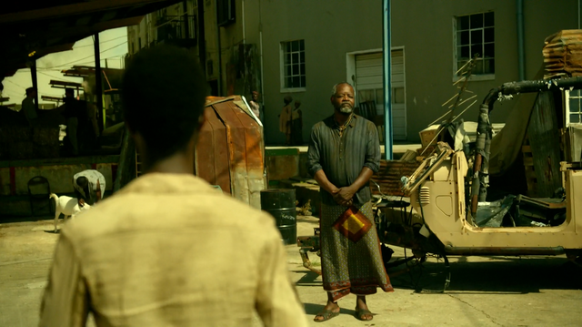 File:Shaman observing the boy.png