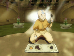 Aang with the Avatar relics.png