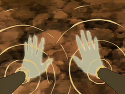 Katara heals her hands.png