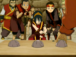 Toph tijdens haar oplichterij.png