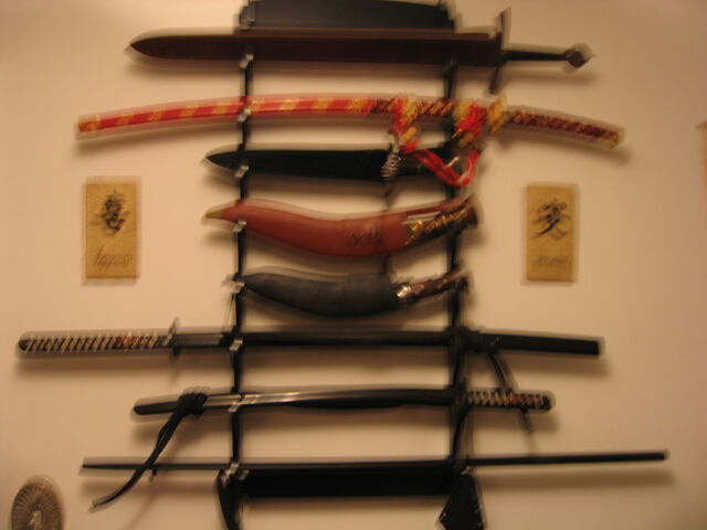 File:MC Escher Weapons 2.jpg