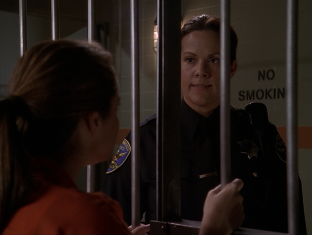 File:8x03FemaleCop.png
