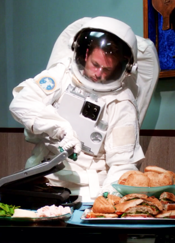 File:Astronaut making paninins.png