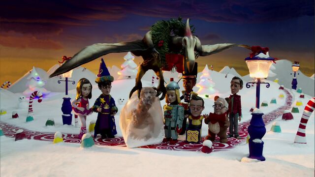 File:S02E11-Christmas Pterodactyl removes Shirley.jpg