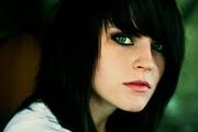 Black hair green eyes