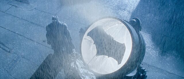 File:Batman stands by the Batsignal - promotional still.jpg