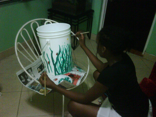 File:Christina helping me to decorate a bucket.png
