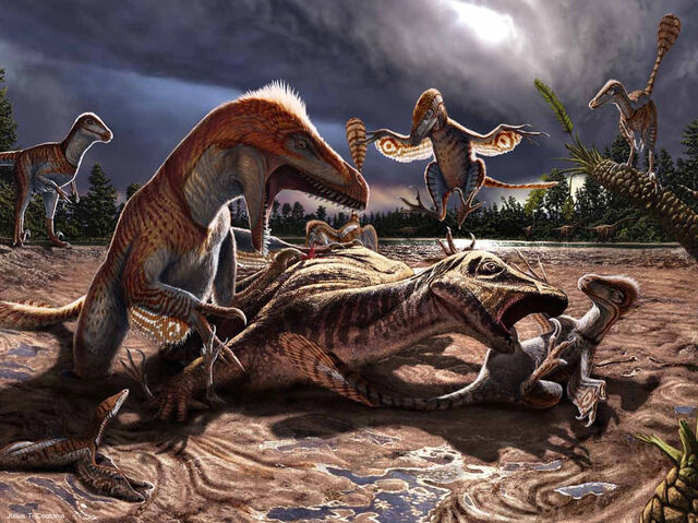 File:UtahraptorAttackingHippodraco.jpg