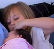 Breanna touching baby niece