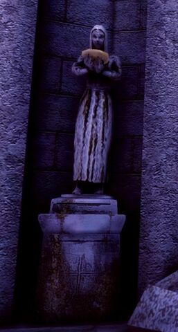 File:Statue holding bowl.jpg