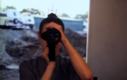 Sean Young with camera SYf.png