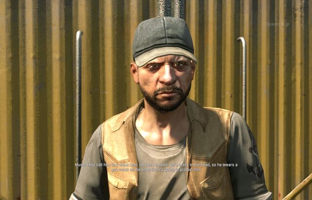 File:GasMaskMan Musa.jpg