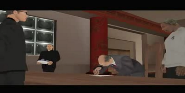 Archivo:Ran fa li firmando.png