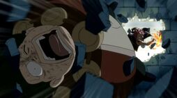 642px-Natsu beats Karcka after he tries to kill his guildmate.jpg