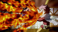 Natsu warming an egg.jpg