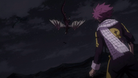 Natsu watches Igneel fall