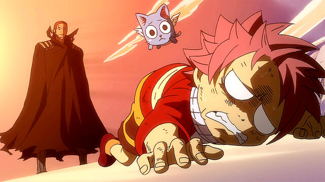 File:Gildarts beats little Natsu.jpg