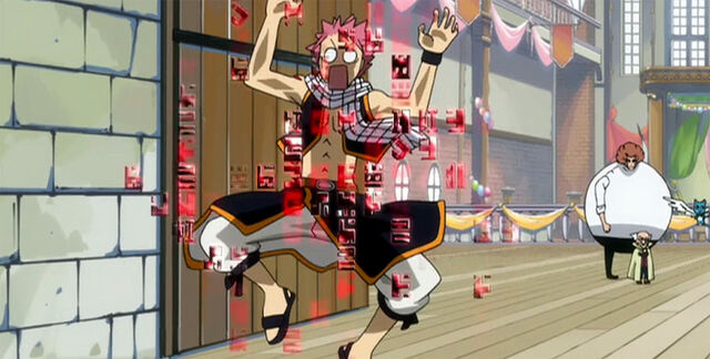 File:Natsu stuck in Freed's enchantment.jpg