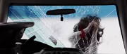 Olivia as she falls through the car