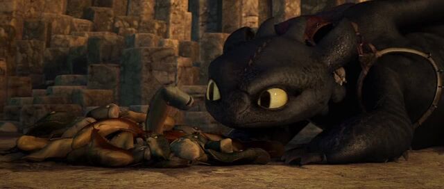 File:Toothless looking at fish questionably.jpg