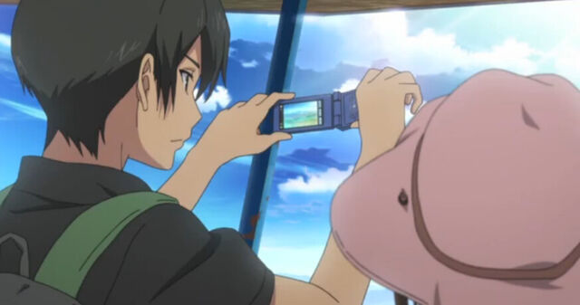 File:YukiTakingPhotos.jpg
