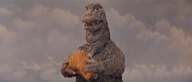 File:MusukoGoji holds a rock.png