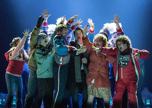 File:Andy Karl as Phil Connors crowded by the company.png