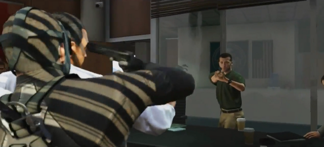 File:Michael threatening the target-GTAV.png