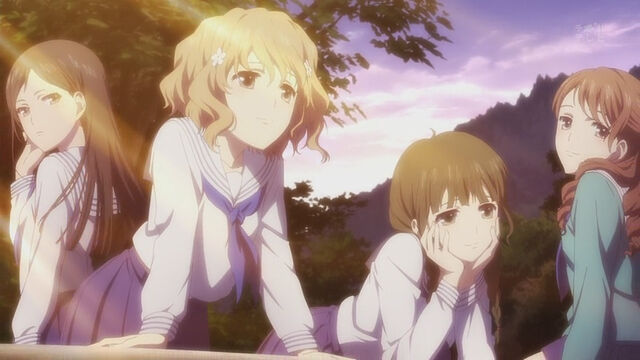 File:Girls standing in sunshine.jpg