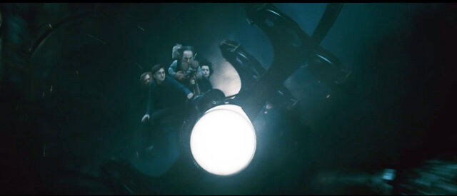 File:DH2 Harry Potter and friends riding at Gringotts Cart.jpg
