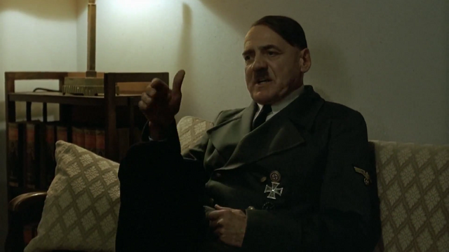 File:Hitler sits in the badass way.png
