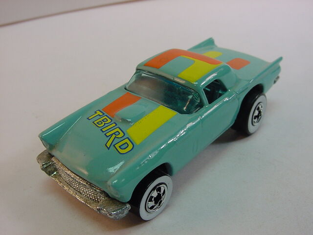 File:57TBird turq -ORANGE-yel-blu-WW 1991.jpg
