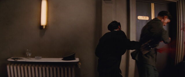 File:Omar shoots guard with OSS Glove Pistol.jpg