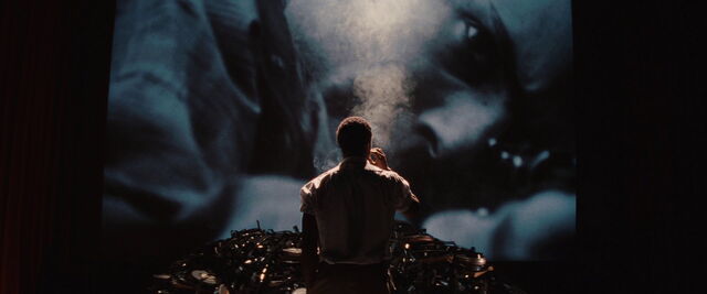 File:Marcel watches the film.jpg