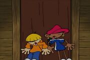 Numbuh 4 and numbuh 5 holding down the door in operation lice