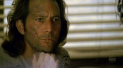 2x23 DesmondWatchingFilm.jpg